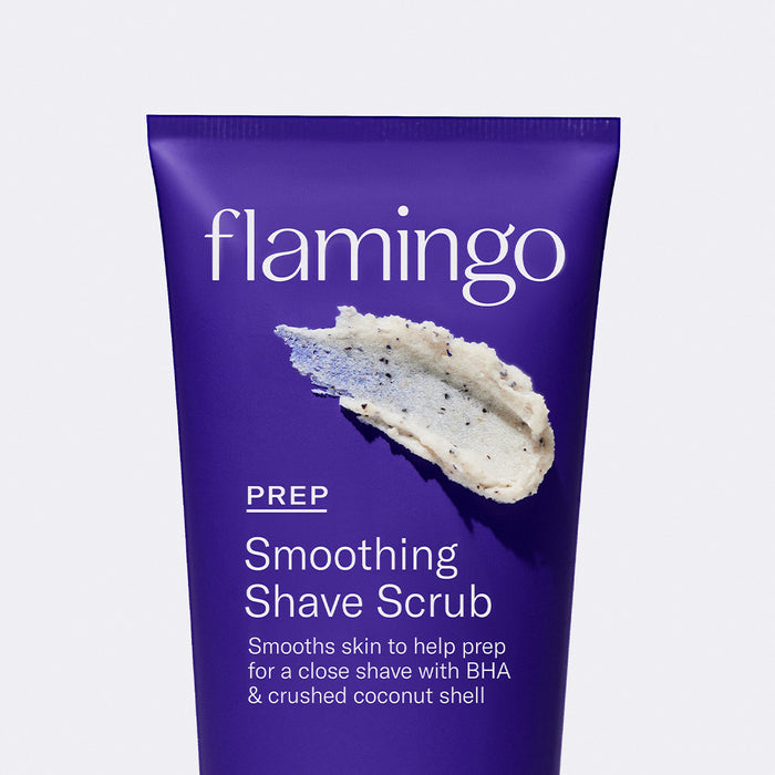 Close up of the top of the Smoothing Shave Prep Scrub tube with a bit of the product smeared on the packaging.