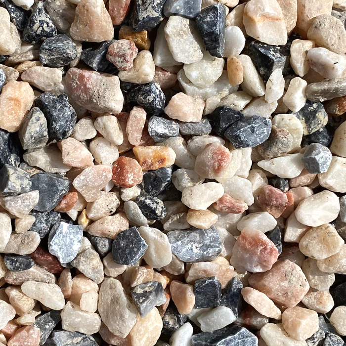 White, pink and blue gravel chippings