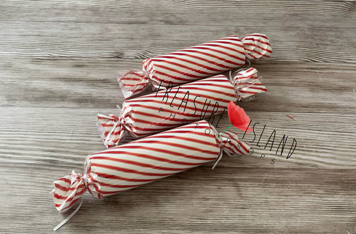 Oversized red and white lollipop prop for Christmas and cake smash photography