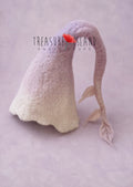Hand-felted lavender ombré bonnet for newborn and sitter photography, featuring a whimsical curved tail with delicate felted leaves, handmade from soft merino wool for lavender, floral and fine art photo sessions.
