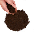 Hands cupping premium top soil