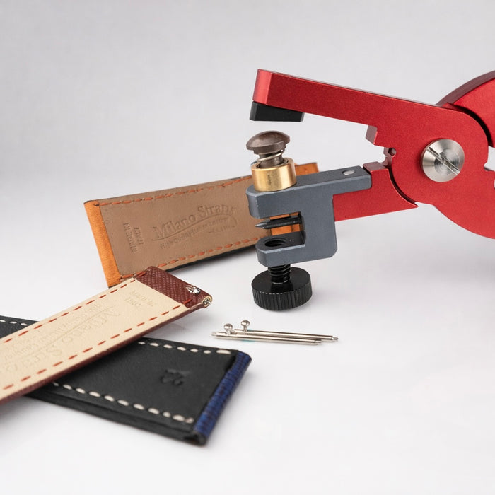 Quick release spring bar hole punch tool for creating strap holes to fit quick release spring bars securely