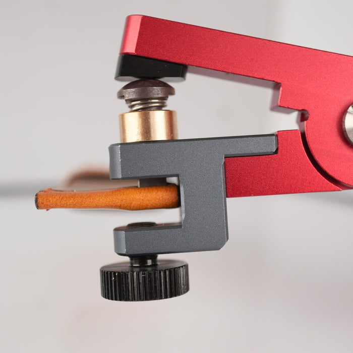 Quick release spring bar hole punch tool for creating strap holes to fit quick release spring bars securely