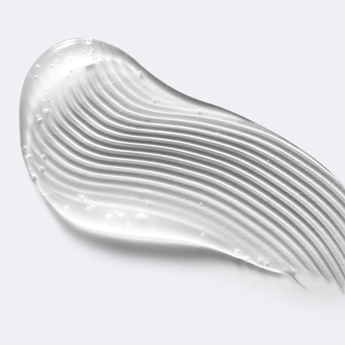 Close up of the Pubic Exfoliating Shave Gel's clear, gel texture.