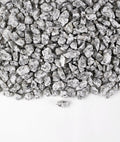 A close-up image of Silver Blue Granite Gravel chippings against a white background.