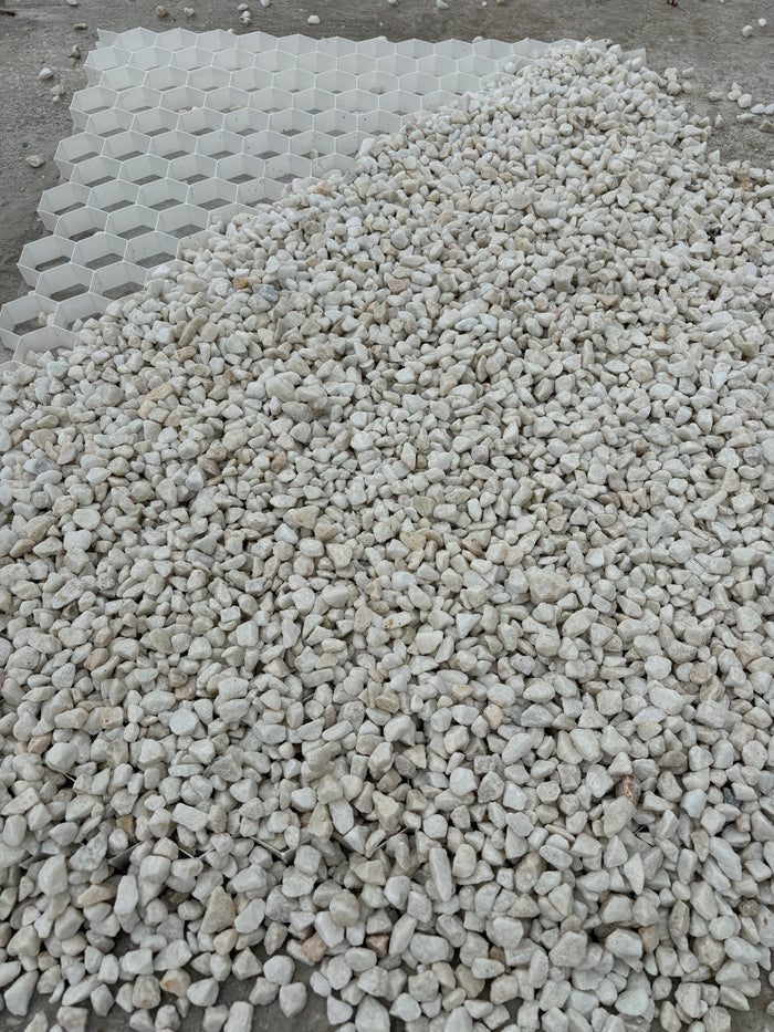 gravel grid half covered in polar white gravel